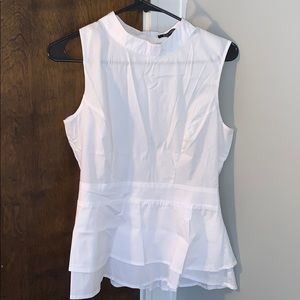 Eva Longoria mock-neck top with cinched waist